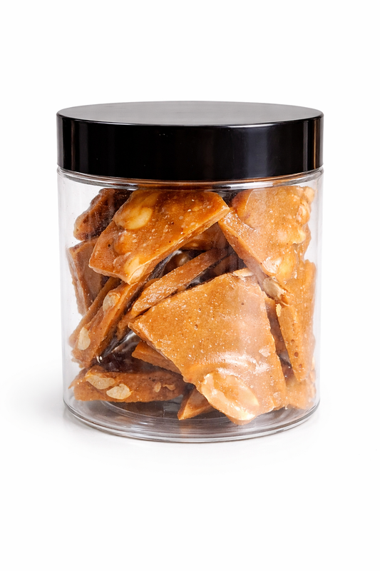 Spicy Cajun Peanut Brittle in a Jar with Black Lid